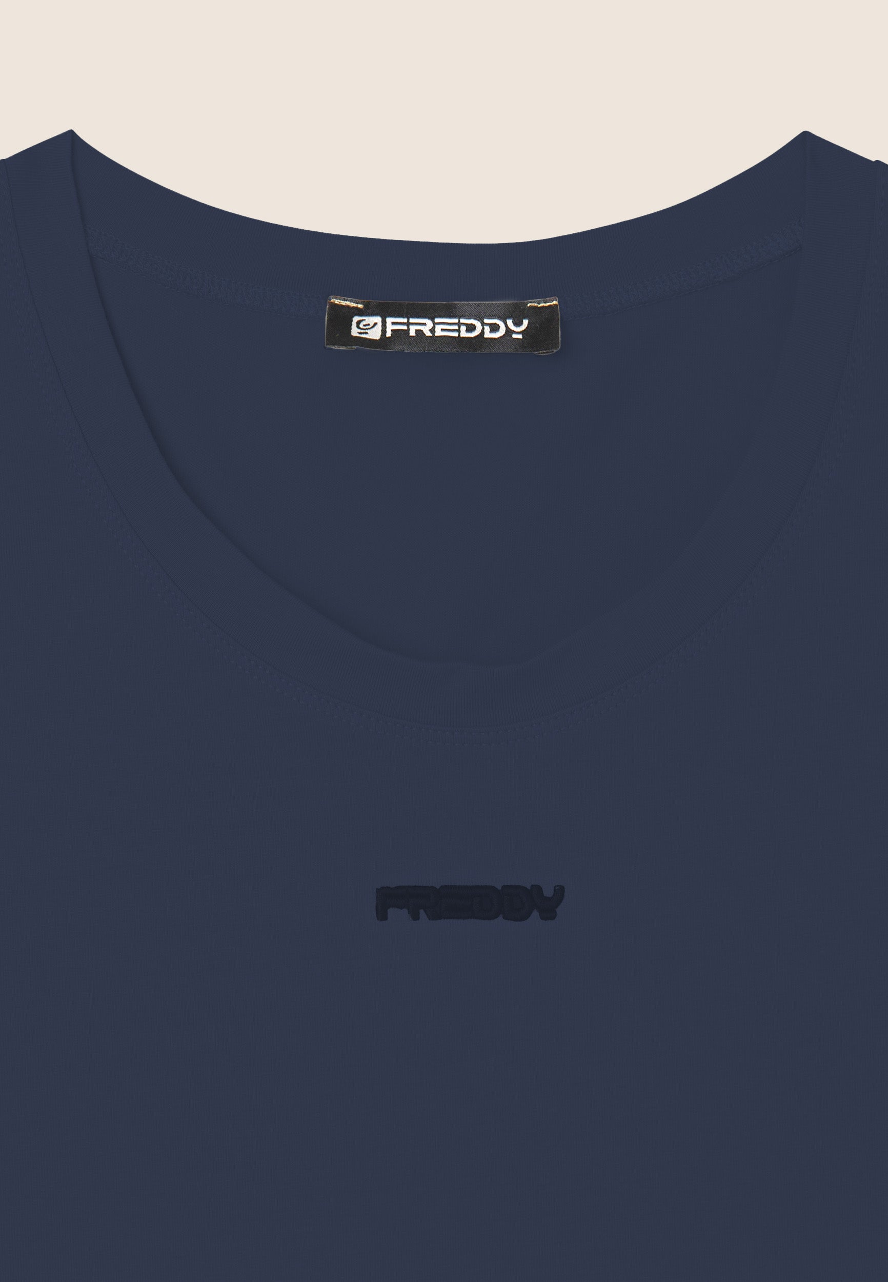 Athletic top in heavyweight stretch jersey with a logo