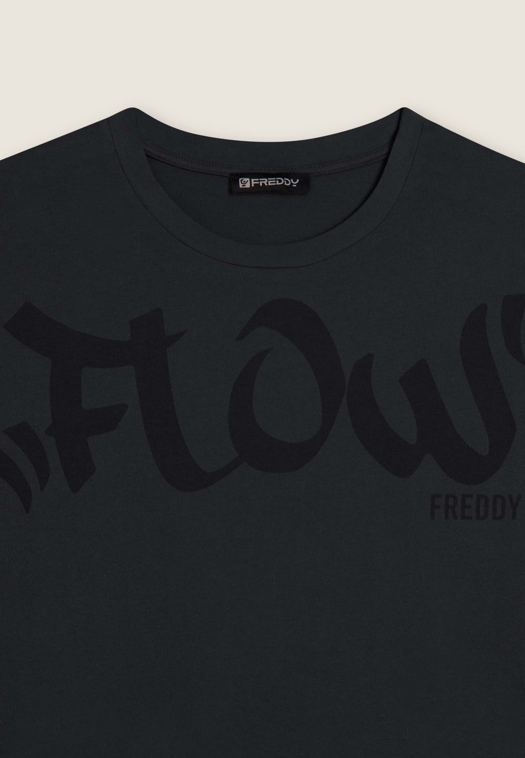 Cropped T-shirt with central Flow print