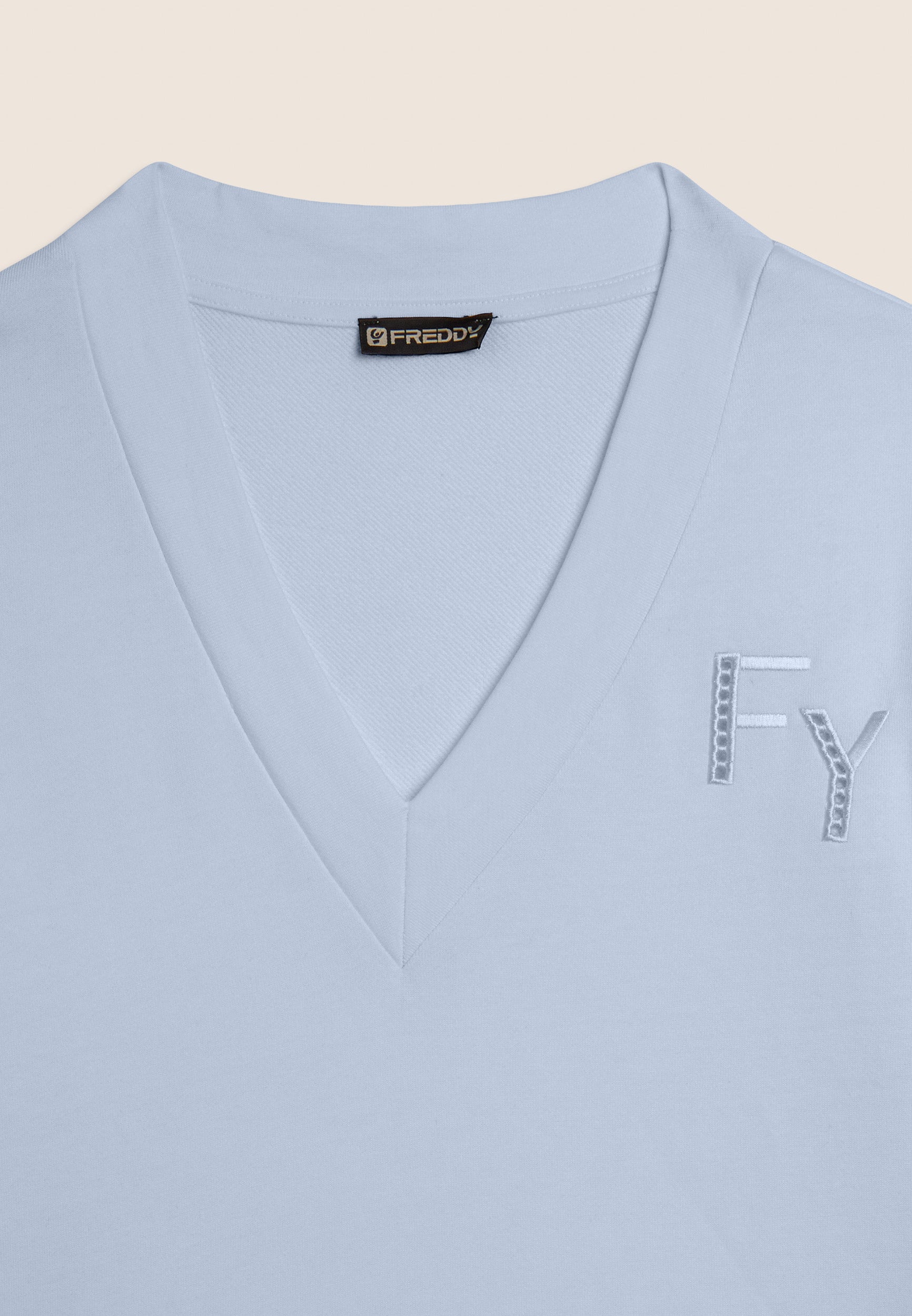 V-neck sweatshirt with dropped shoulder and embroidered details