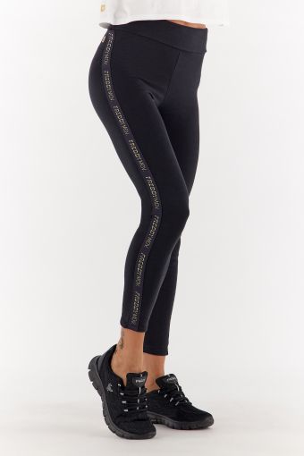 Ankle-length fleece leggings with lateral bands trimmed in gold lettering