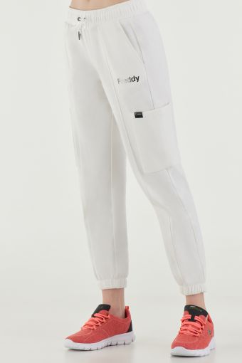 Joggers with lateral cargo pockets and covered elastic cuffs