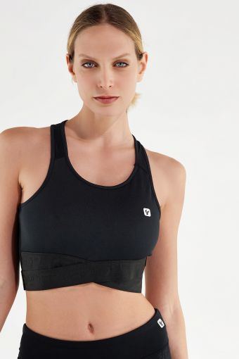 Black breathable sports bra with crossed underbands