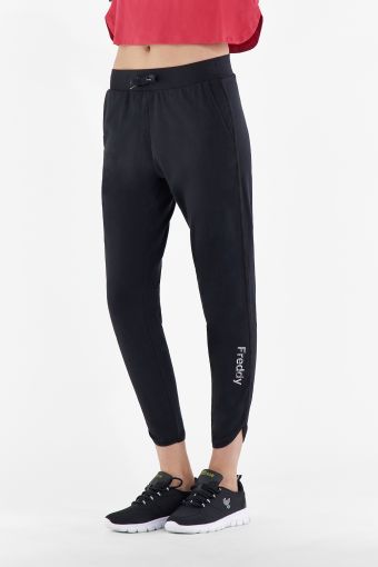 Athletic trousers with floral print and slits at the bottom