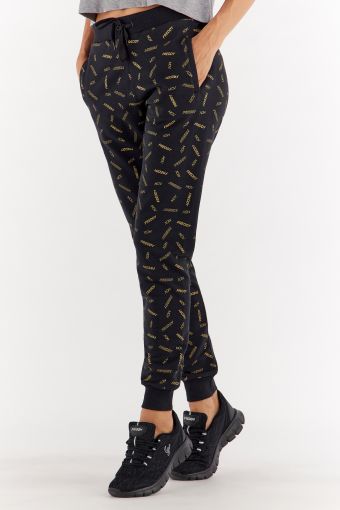 Black joggers with a gold all-over FREDDY MOV. print