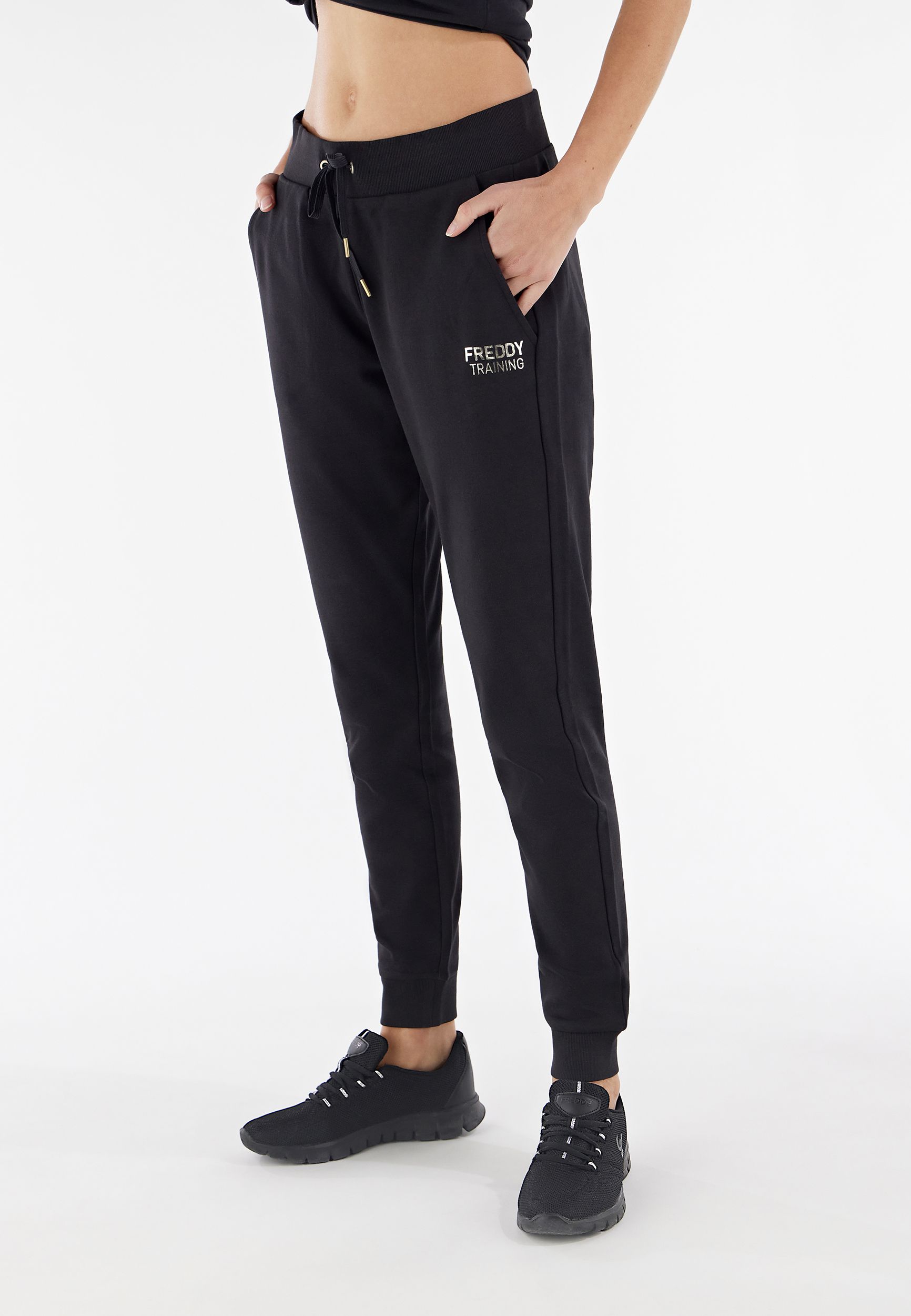 Ankle length interlock joggers with a small light gold print